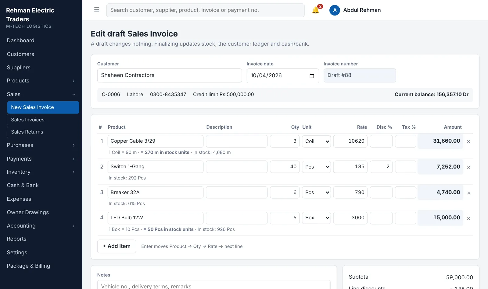 Sales invoice screen with product lines, units, discount, tax and totals